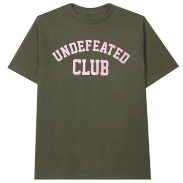 An olive green short-sleeve t-shirt with 'UNDEFEATED CLUB' printed in pink varsity-style lettering across the chest, shown against a plain white background.