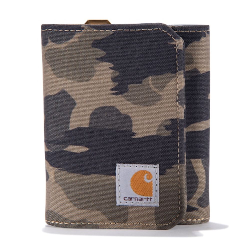 A Carhartt canvas wallet in a brown, beige, and black camouflage pattern, featuring a white Carhartt brand patch on the front flap.
