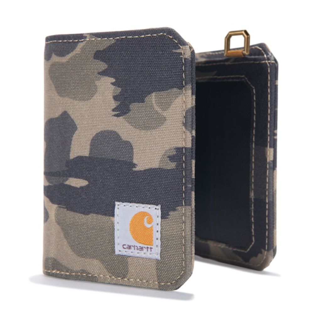 A Carhartt camouflage canvas card holder wallet shown from the front and side, featuring a white Carhartt logo patch on the front and a gold-tone metal loop at the top, set against a plain white background.