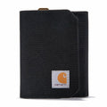 A black Carhartt canvas wallet with a white brand patch featuring the signature orange 'C' logo, shown on a clean white background.