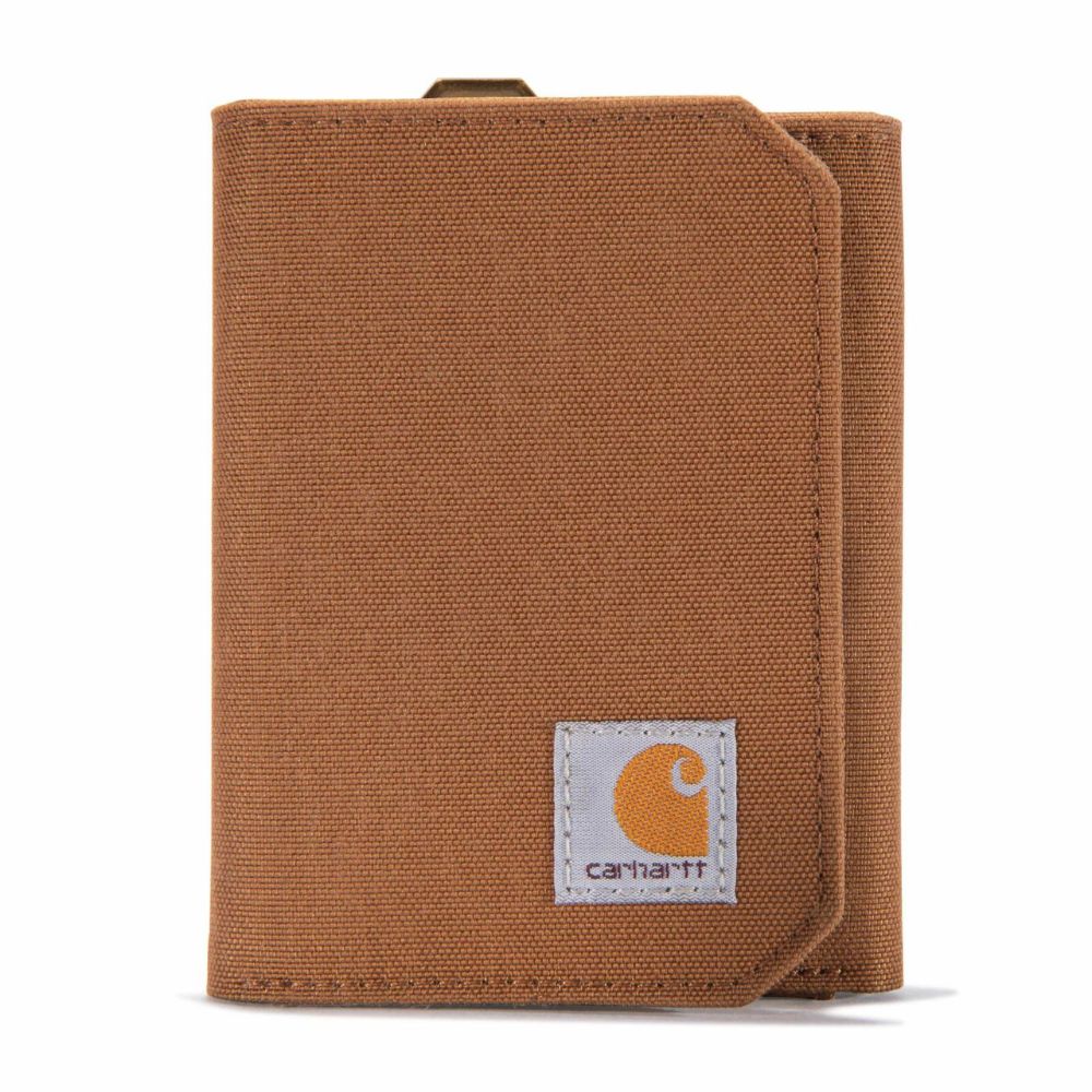 A brown canvas bifold wallet with a white Carhartt brand patch on the lower right corner, shown against a plain white background.