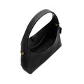 A black leather handbag with a structured top handle, shown from an elevated angle on a clean white background. It features small gold-tone metal hardware accents on the handle attachments.