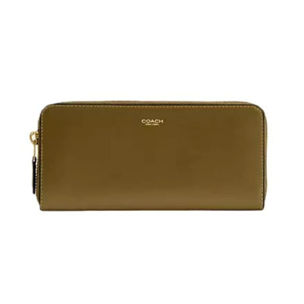 A Coach zip-around wallet in olive green leather with gold-tone hardware and a gold logo on the front, shown against a plain white background.