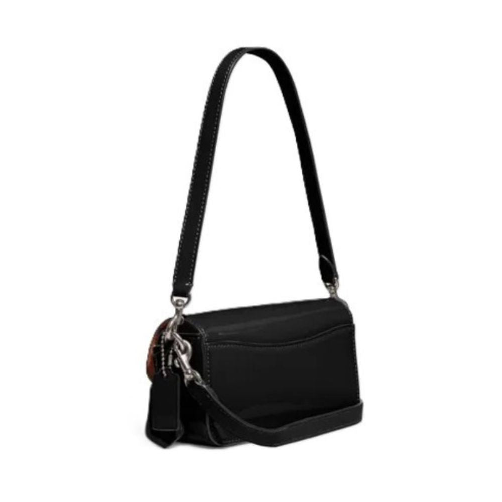 A black leather shoulder bag with a long strap and silver-tone hardware, shown from a side profile on a white background.