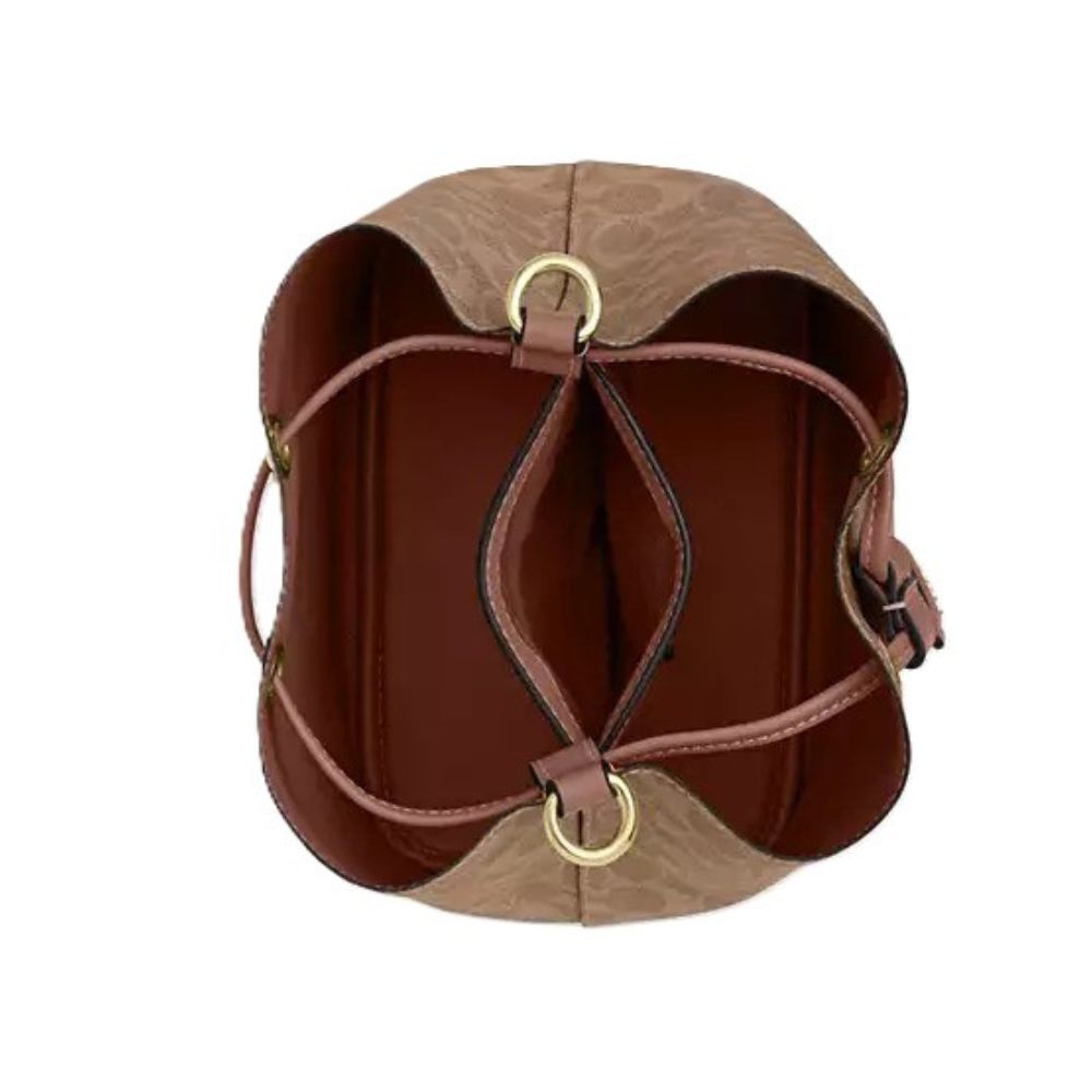 Top-down view of a brown leather shoulder bag with a textured pattern, featuring gold-tone metal rings and straps on a white background.