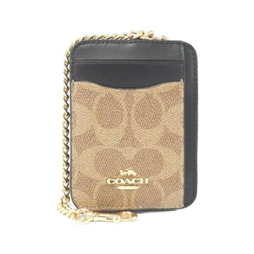 A Coach mini card holder wallet in signature canvas with black leather trim and a gold-tone chain strap, shown on a plain white background.