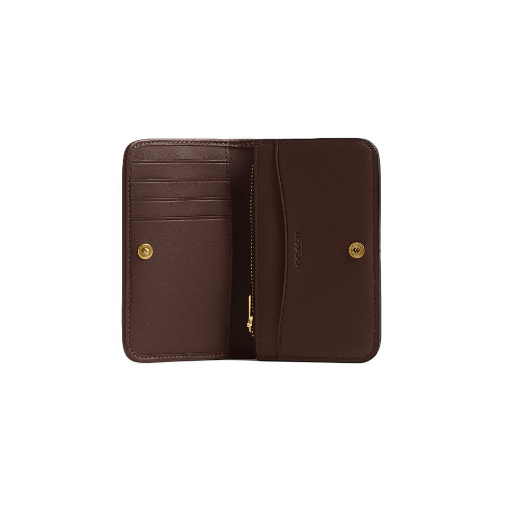 A dark brown leather wallet shown open, displaying its interior card slots, zipper compartment, and gold-tone hardware against a plain white background.