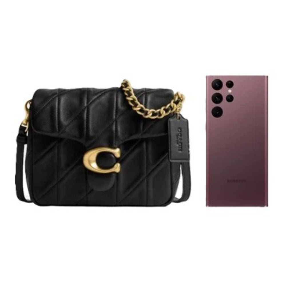 A black quilted leather shoulder bag with a gold chain strap and a large gold 'C' logo on the front, shown next to a dark plum Samsung Galaxy S24 Ultra smartphone on a plain white background.