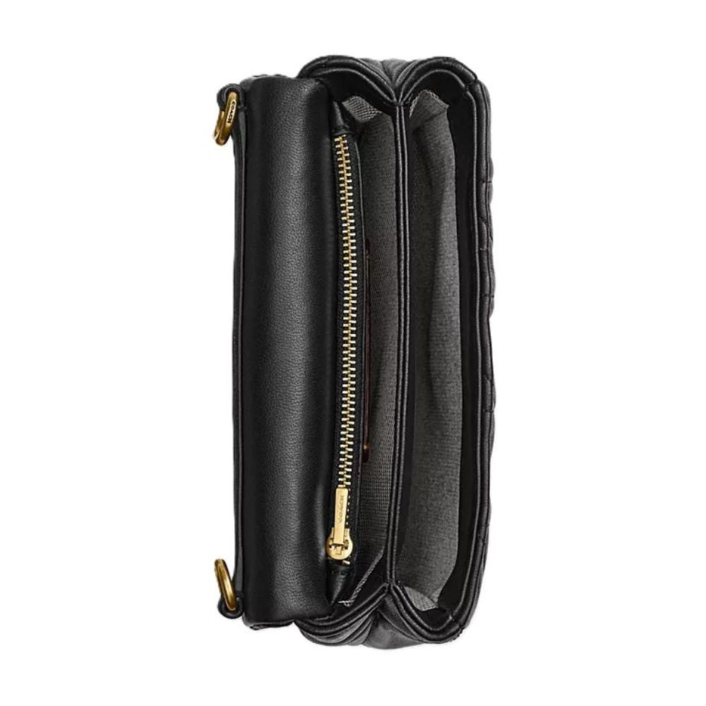 Black leather clutch handbag with gold-tone hardware, shown open to reveal the interior compartments and zippered pocket, set against a plain white background.