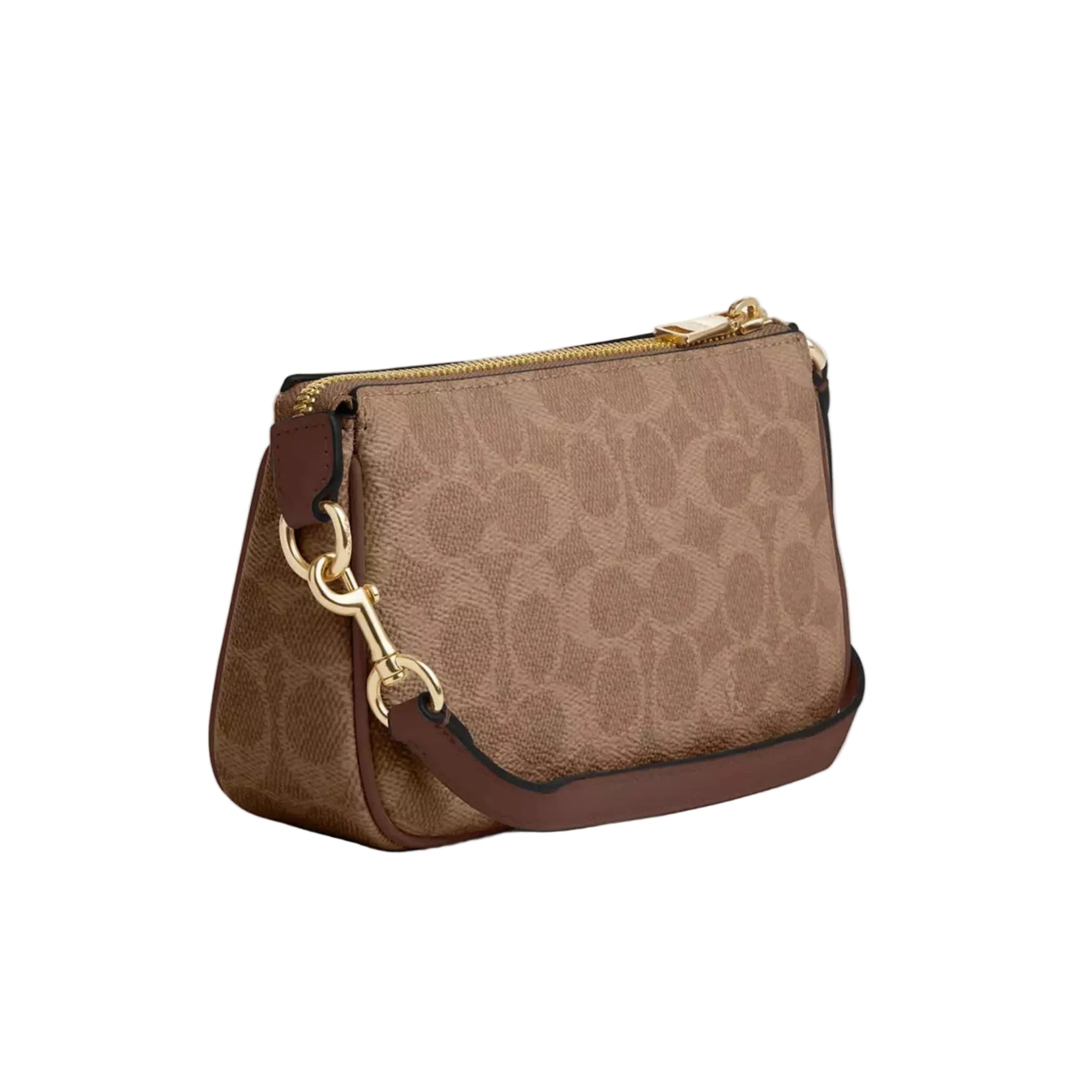 A small Coach crossbody bag in brown signature monogram canvas with dark brown leather trim and gold-tone hardware, shown on a light gray studio background.