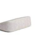 A light beige rectangular armrest cushion with a subtle monogram pattern, shown on a plain white background.