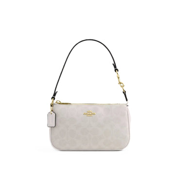 A Coach shoulder bag in light beige monogram canvas with a black leather strap and gold-tone hardware, shown against a plain white background.