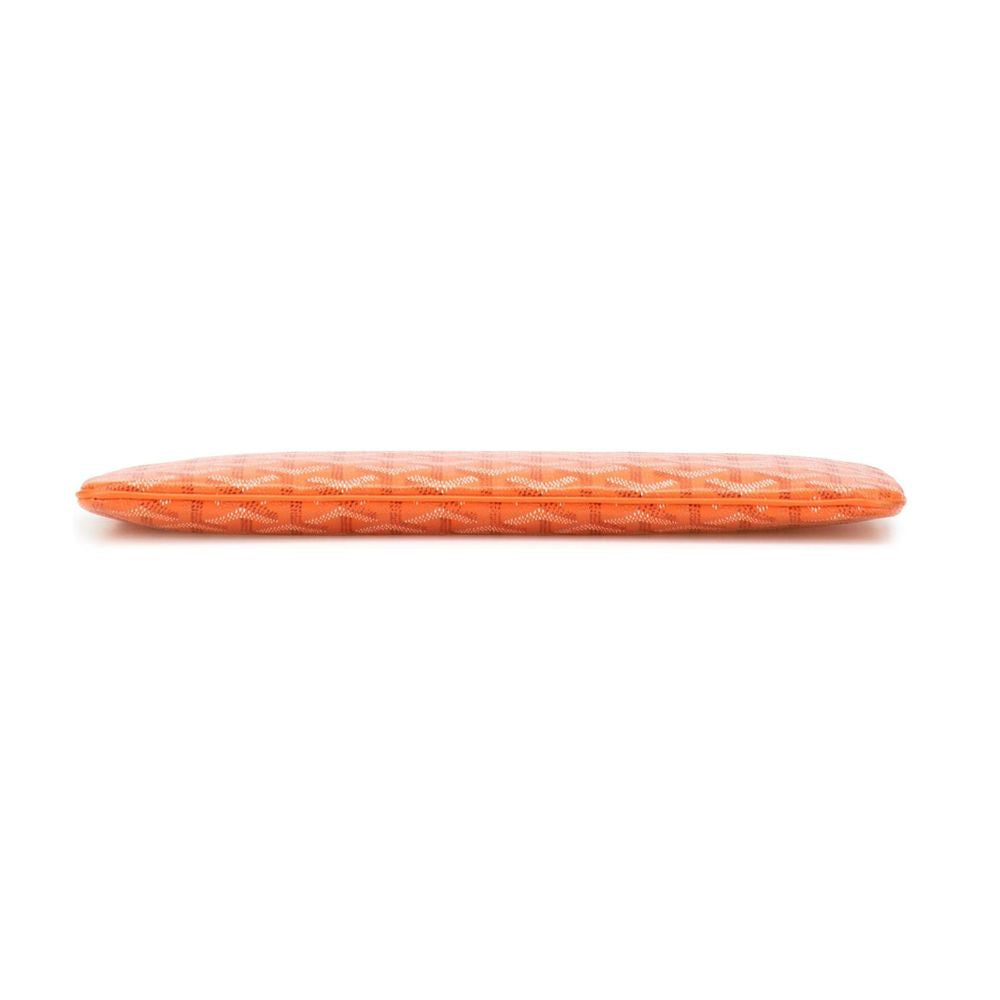 An orange quilted rectangular cushion or pillow with a textured diamond pattern, shown horizontally against a plain white background.