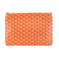 An orange Goyardine zip pouch featuring the brand's signature repeating chevron pattern in orange and white, shown against a plain white background.