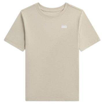 A short-sleeve crewneck t-shirt in a light beige color, featuring a small white rectangular KLEIN logo patch on the left chest, displayed against a solid white background.