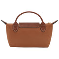 A structured brown handbag with a smooth coated canvas body, a top handle, and textured leather trim details on the handle attachments and front flap, shown against a plain white background.