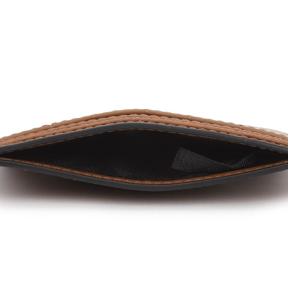 Close-up of the interior of a brown textured leather card holder or wallet, showing tan stitching, a black inner lining, and a black edge trim on a white background.