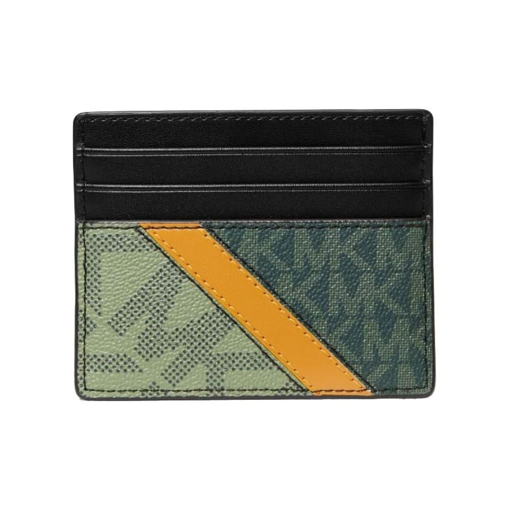 A Michael Kors card holder wallet featuring a black leather top section with card slots, and a lower section with a green and black MK monogram pattern split diagonally by a mustard yellow stripe.