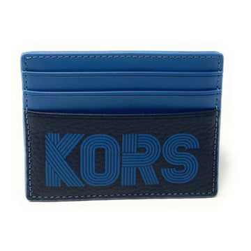A blue and black leather cardholder wallet with the brand name 'KORS' embossed in blue on the front, set against a plain white background.