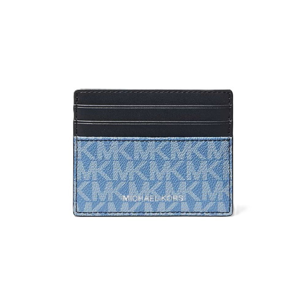 Michael Kors card holder wallet in blue monogram canvas with a black leather top band, shown on a plain white background.