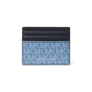 Michael Kors card holder wallet in blue monogram canvas with a black leather top band, shown on a plain white background.