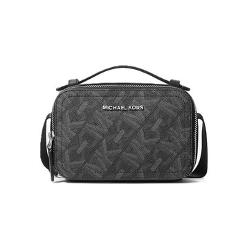 Michael Kors black monogram camera bag with a top handle, front zip closure, and silver-tone logo lettering on a white background.