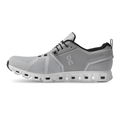 Black athletic shoe with white sole on a white background