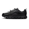 A black On running shoe with a chunky, wavy sole, shown in a side profile on a white background.