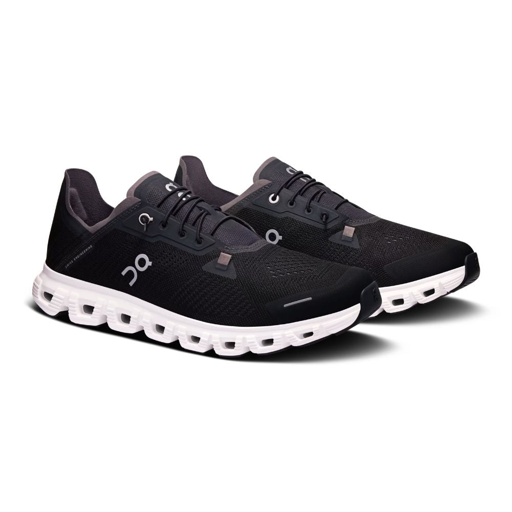 A pair of black On running shoes with a white cloud-like sole, displayed on a clean white background.