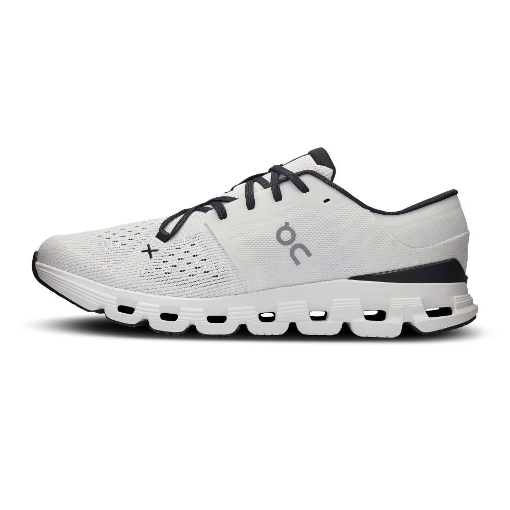 A white On Cloudrunner sneaker with black laces, a black heel accent, and a gray On logo on the side, shown in a side profile against a white background.
