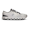 A white On running shoe with black laces, black heel accent, and a gray On logo on the side, shown in a side profile against a white background.