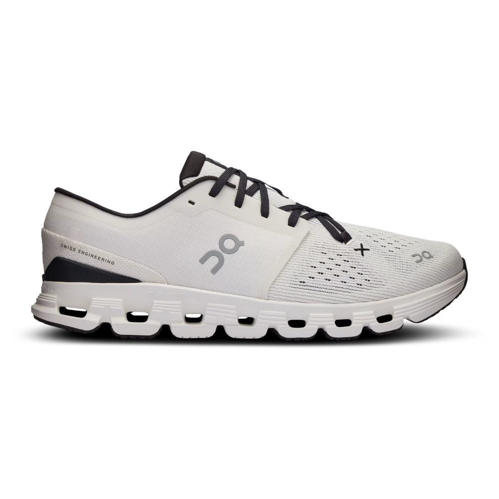 A white On running shoe with black laces, black heel accent, and a gray On logo on the side, shown in a side profile against a white background.