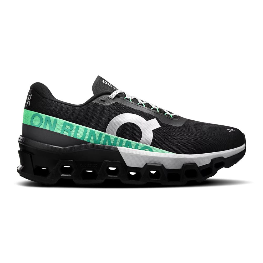 A black On Cloudrunner sneaker with a distinctive green and white 'ON RUNNING' logo on the side, featuring a chunky black cloud-like sole and white laces, shown against a plain white background.