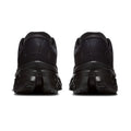 A pair of black On running shoes shown from the rear, featuring a chunky black sole and subtle tonal branding on a clean white background.