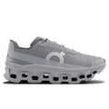 Pink running shoe with white sole on a light gray background