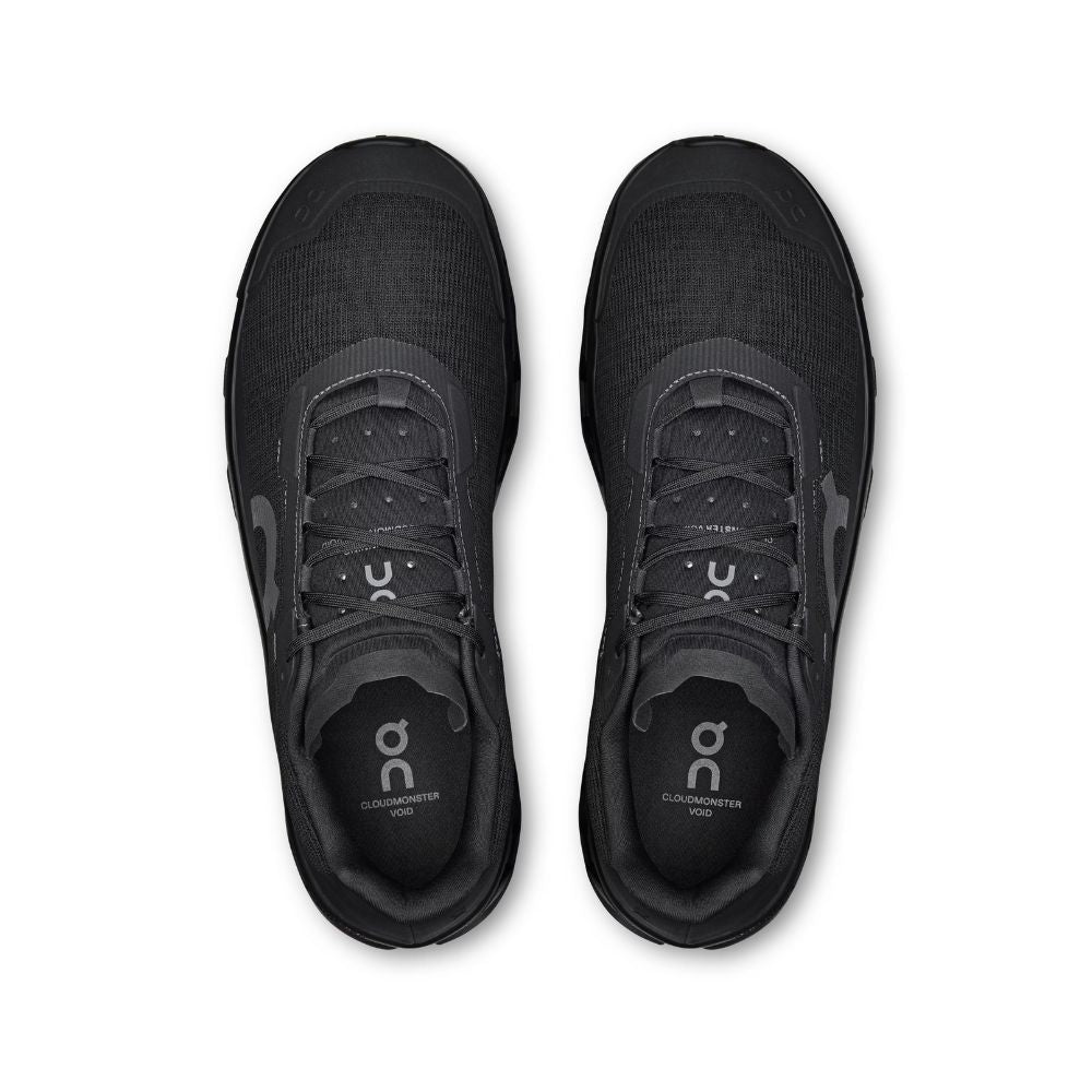 A pair of black On running shoes shown from a top-down view against a plain white background.