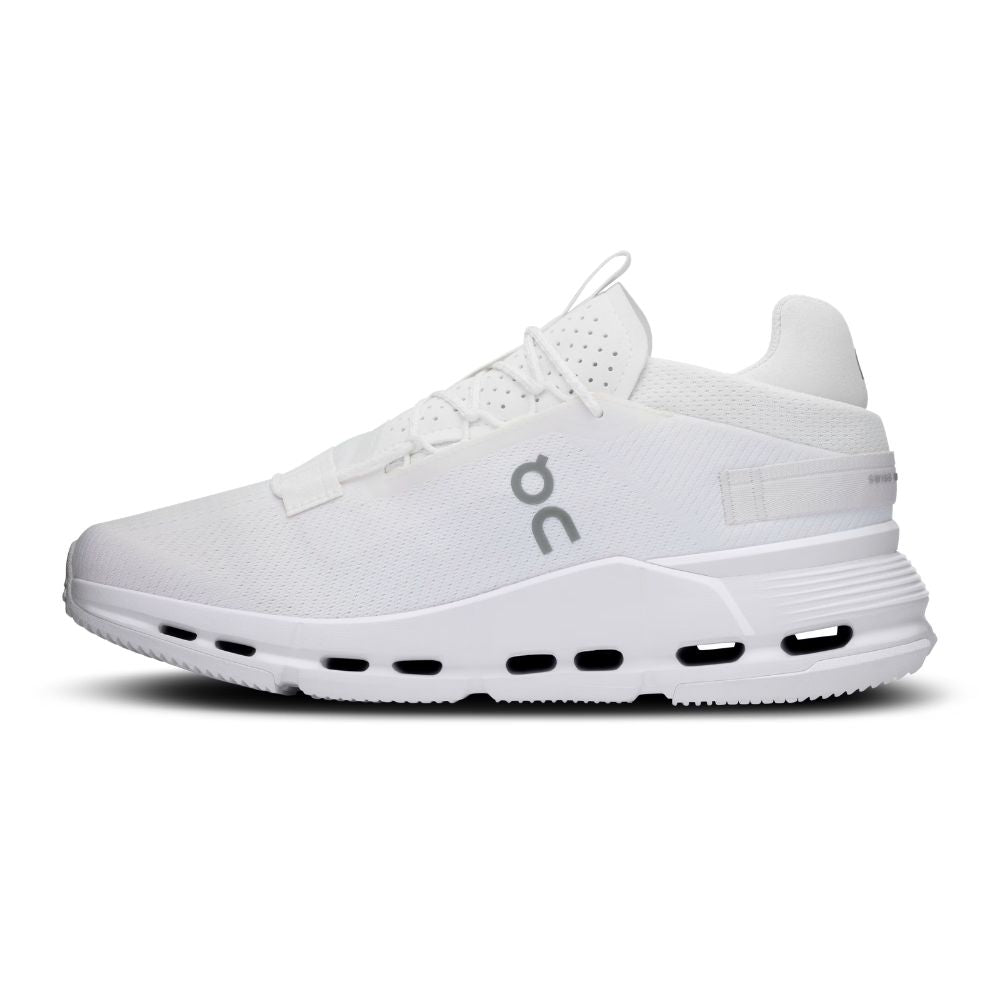 A white On running shoe shown from the side against a plain white background, featuring a white mesh upper, white laces, a white midsole with visible air pockets, and a gray On logo on the side.