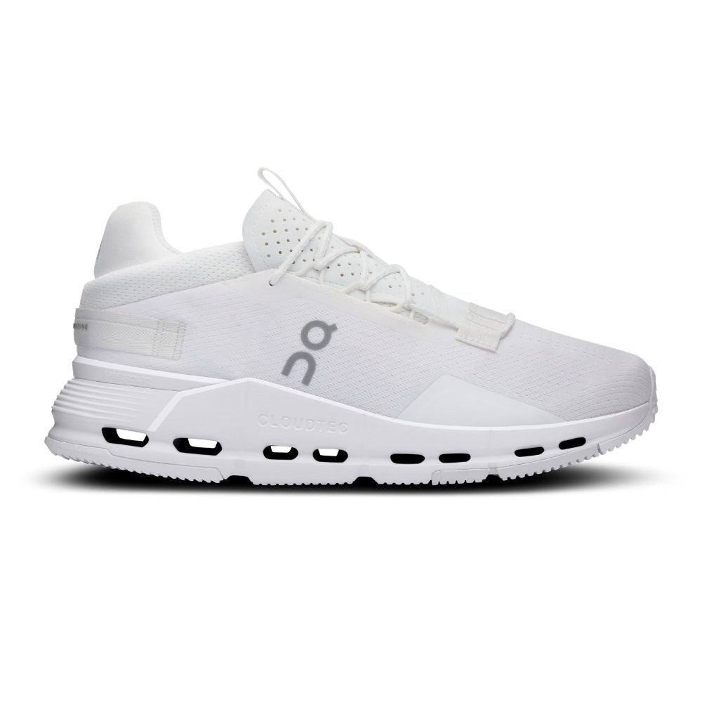A white On Cloudrunner sneaker shown from the side profile against a clean white background. The shoe features a white mesh upper, white laces, a thick white CloudTec sole, and a gray 'on' logo on the side.