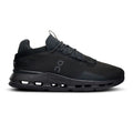 Black sneaker with gray sole on a white background