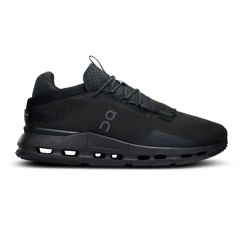 Black sneaker with gray sole on a white background