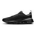 Black shoe with unique sole design on a white background