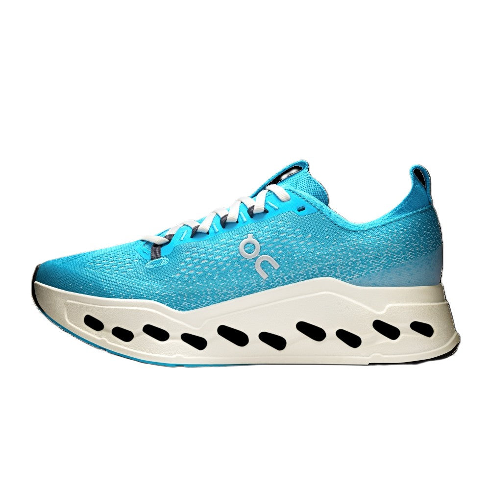 A light blue athletic sneaker with a chunky white sole featuring black cutouts, shown from the side on a white background.