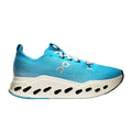 A bright blue running shoe with a chunky white midsole featuring black cutouts, shown from a side profile on a white background.