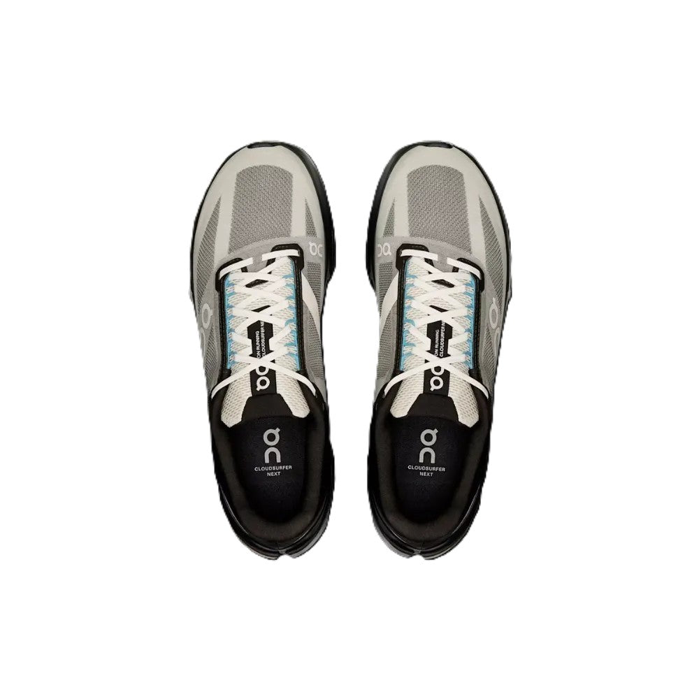 A pair of On running shoes in gray, black, and white, viewed from a top-down perspective on a solid white background.
