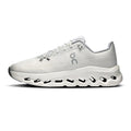 A white On running shoe with a chunky, sculpted white midsole featuring black cutout details, shown in a side profile on a white background.