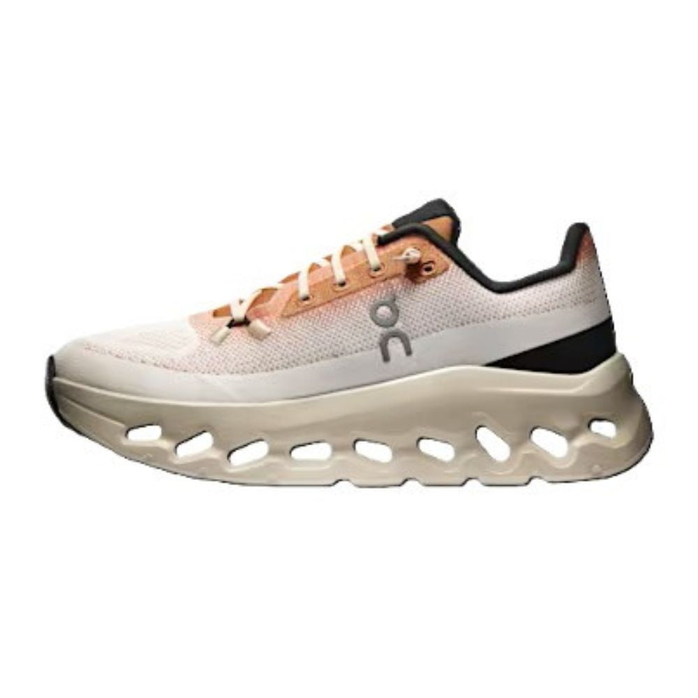 A single On Cloudrunner sneaker shown in a side profile view against a plain white background. The shoe features a light beige and white mesh upper, peach-colored laces, a black heel accent, and a thick, sculpted beige midsole with distinctive cutouts.