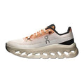 A single On Cloudrunner sneaker shown in a side profile view against a plain white background. The shoe features a light beige and white mesh upper, peach-colored laces, a black heel accent, and a thick, sculpted beige midsole with distinctive cutouts.