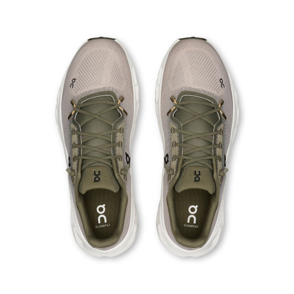 Pair of gray running shoes with white soles on a white background