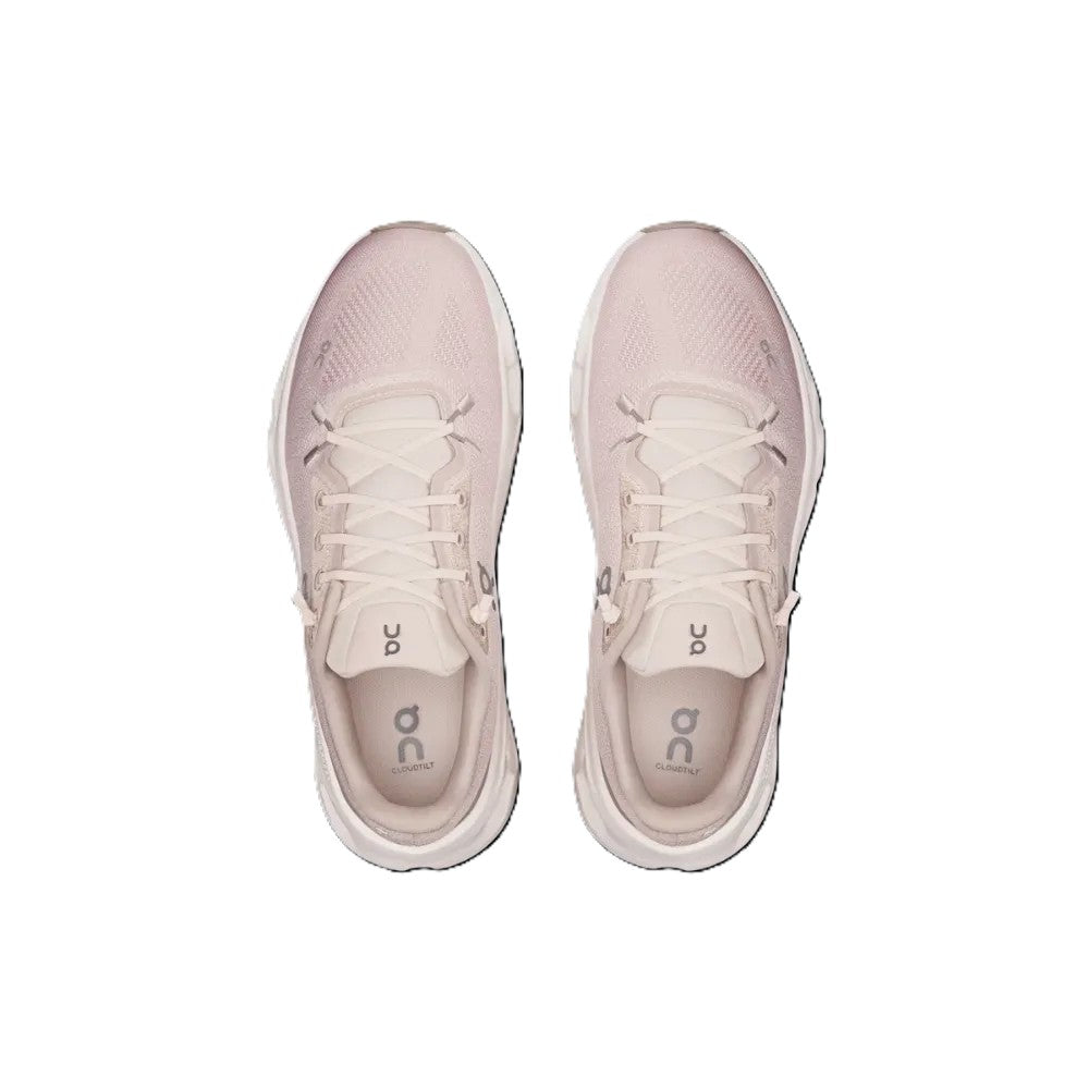 A pair of light pink running shoes shown from a top-down view on a solid white background.