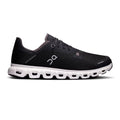 Navy running shoe with white sole on a white background